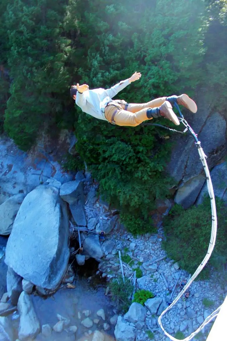 Jumper mid free fall on the bungee cord