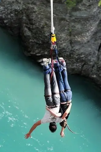 Jumper being lowered after the bungee jump