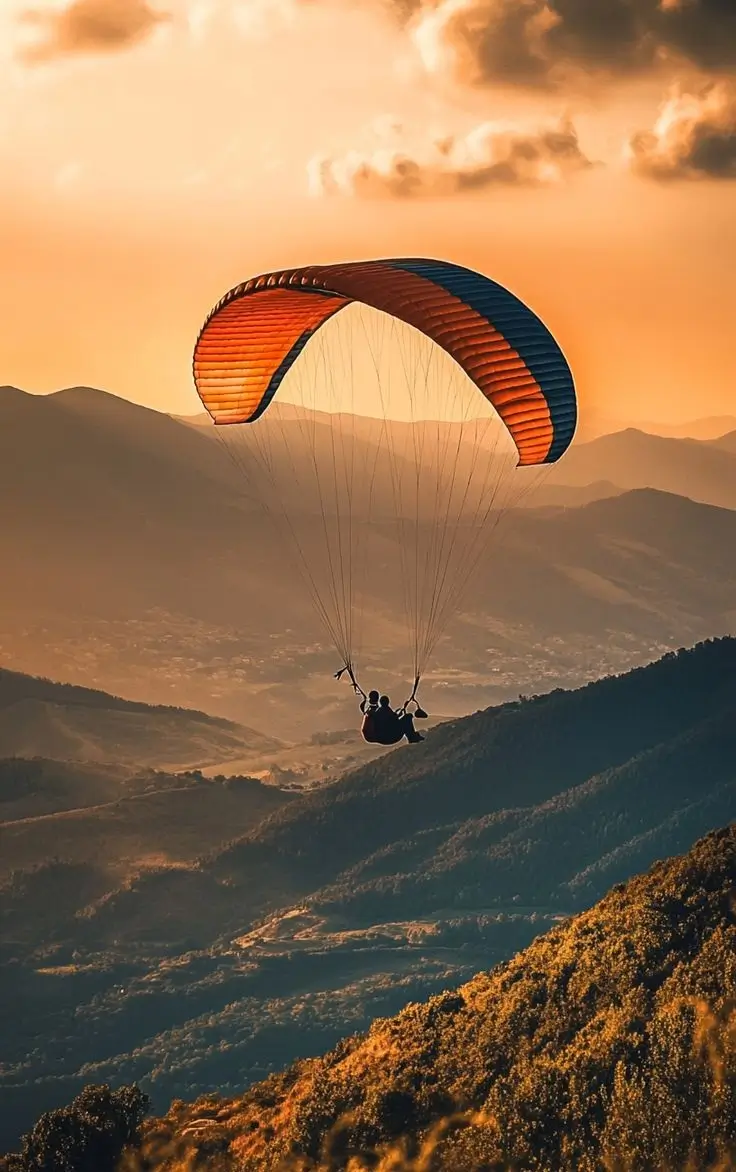 Tandem paraglider over the valley near Rishikesh